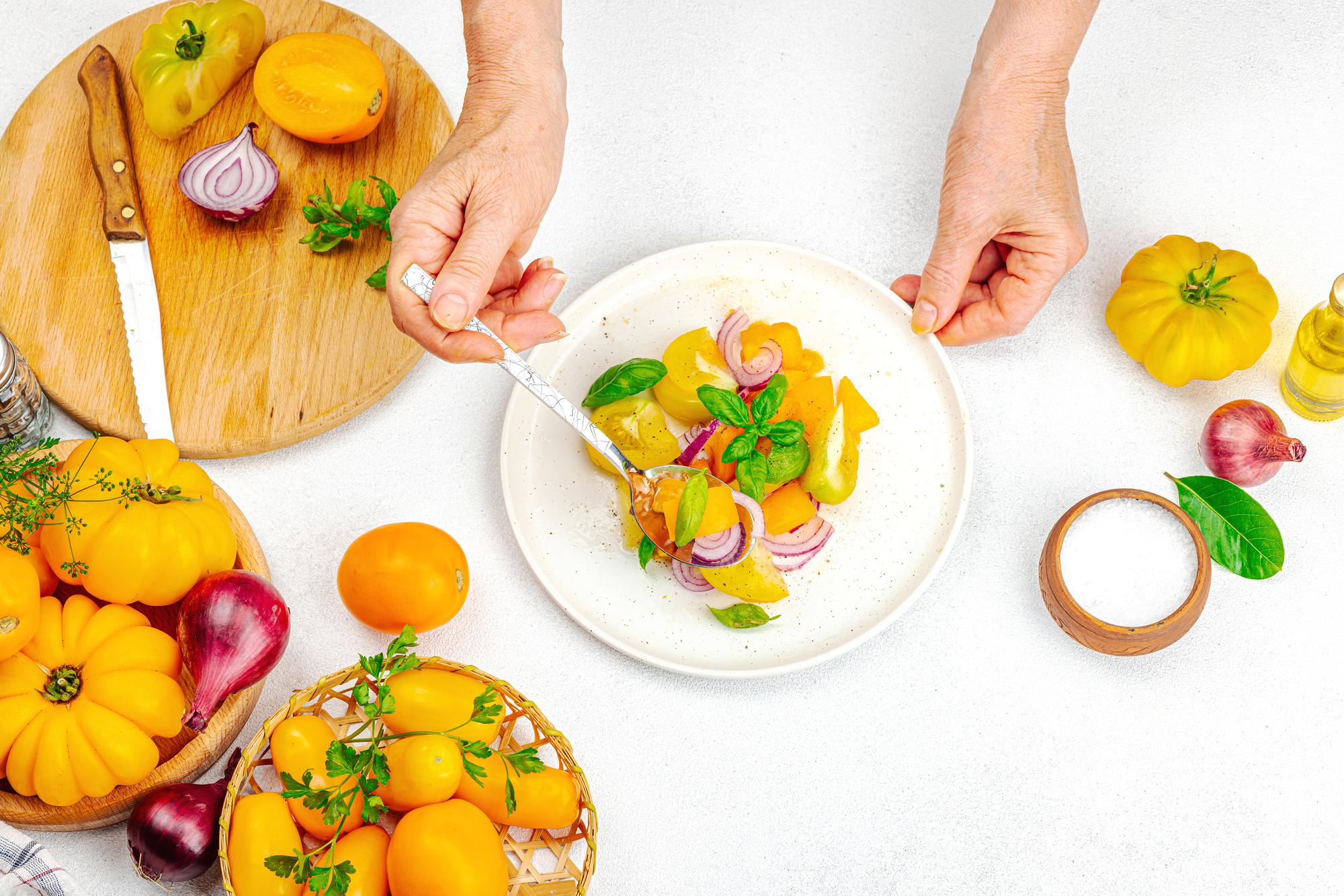 Chef plating a colorful quick meal